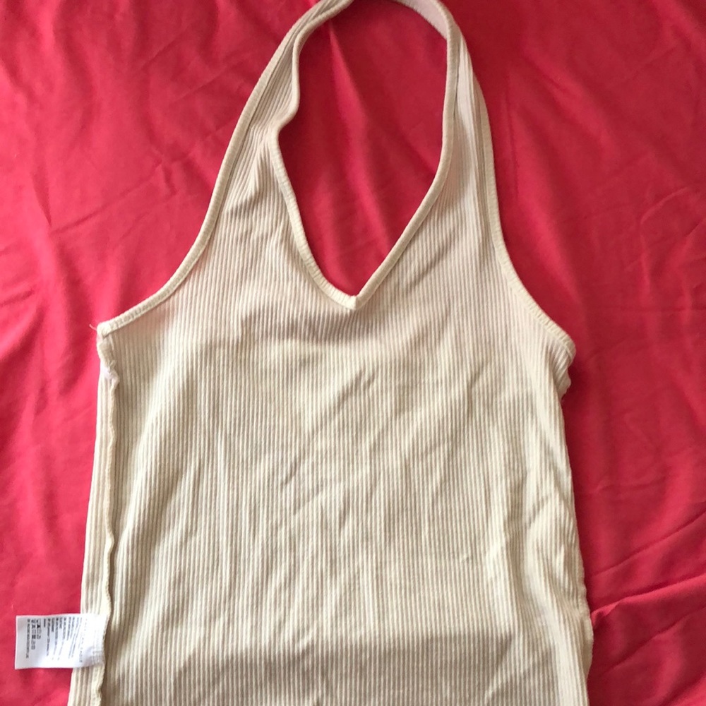 Tan crop top with no sleeves